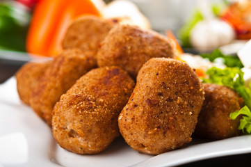 Eating fast food, on a plate