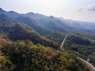 Fototapeta premium Aerial shot of highway to the mountains.