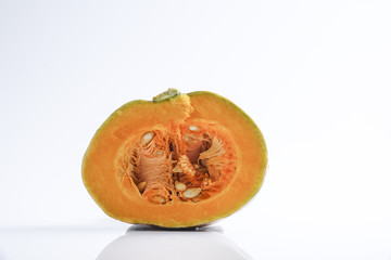 Sweet orange pumpkin isolated on white.