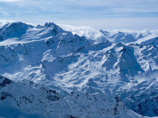 Fototapeta na wymiar Winter landscape from mount Titlis over Engelberg
