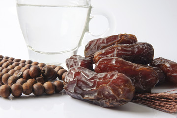 A dates and glass of water - the things used to break the fast at sunset during the Muslim holy month of Ramadan