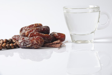 A dates and glass of water - the things used to break the fast at sunset during the Muslim holy month of Ramadan
