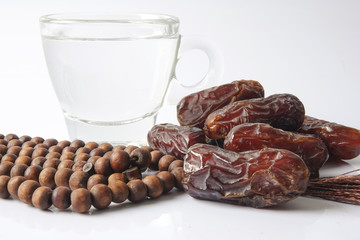 A dates and glass of water - the things used to break the fast at sunset during the Muslim holy month of Ramadan