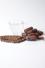 A dates and glass of water - the things used to break the fast at sunset during the Muslim holy month of Ramadan