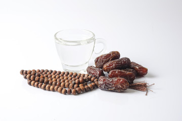 A dates and glass of water - the things used to break the fast at sunset during the Muslim holy month of Ramadan