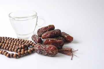 A dates and glass of water - the things used to break the fast at sunset during the Muslim holy month of Ramadan