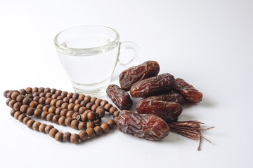 A dates and glass of water - the things used to break the fast at sunset during the Muslim holy month of Ramadan