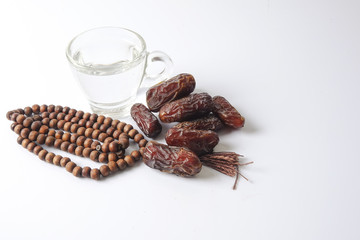 A dates and glass of water - the things used to break the fast at sunset during the Muslim holy month of Ramadan
