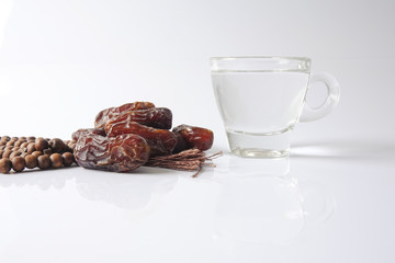 A dates and glass of water - the things used to break the fast at sunset during the Muslim holy month of Ramadan