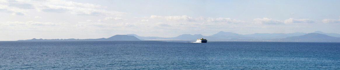   Ocean Panorama Ferry  with the Northern Coast of Fuerteventura and the Island of Lobos in the Background.