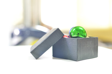 Ball on box on blur background.