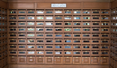 many wooden mailbox used for many people