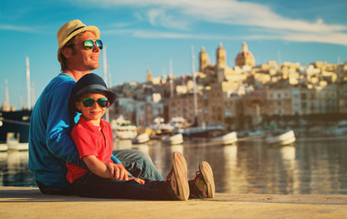 father and son looking at city of Valetta, Malta
