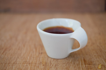 Closeup hot tea in white ceramic cup