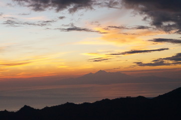 Fototapeta premium Sunrise with Mount Rinjani at Distance