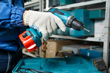 Male hand holding a screwdriver