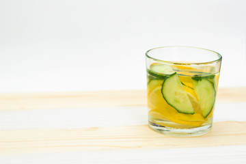 water with lemon and cucumber. copy space