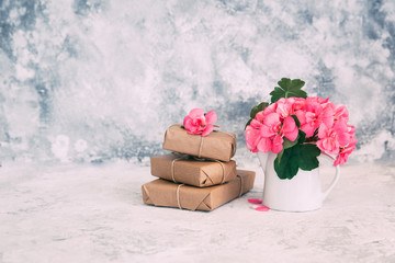 Handmade wrapped gift boxes with flowers. Present for mothers day