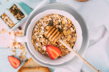 Oat flakes in bowl and fruits