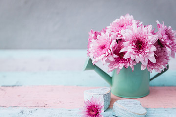 Summer Flowers in Watering pot with copy Space