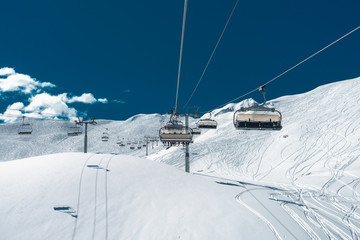 Fototapeta na wymiar ski lift cables and seats