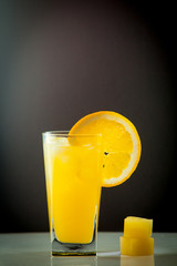 Orange juice and slices of orange fruit