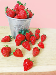 Fresh strawberries on a wooden table