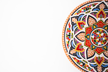 Oriental ceramic plate with beautiful colorful ornament