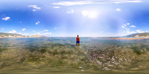 Spherical panorama 360 180 man standing in the sea