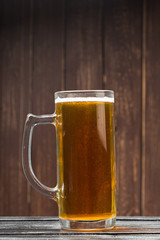 beer glass on a wooden background