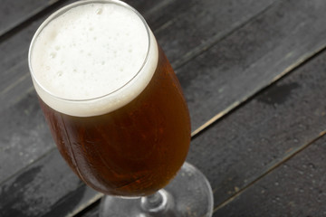 beer glass on a wooden background