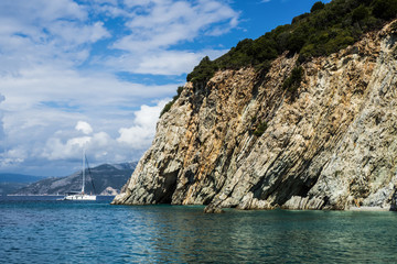 Fototapeta na wymiar Sailing near cliffs
