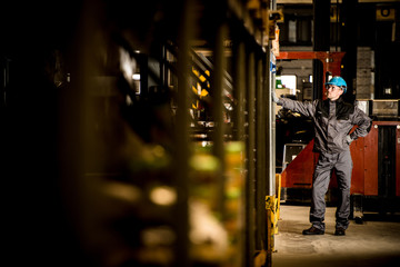 Caucasian Warehouse worker with blue Safety Helmet