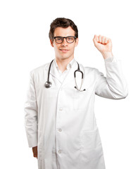 Happy doctor celebrating against white background