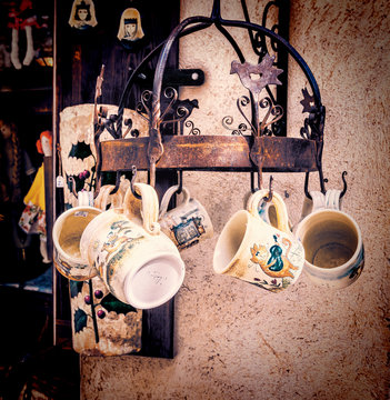 Handmade ceramic mugs at street market in Besalu, Spain