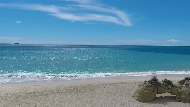 beach of armacao de pera on portugals algarve coast