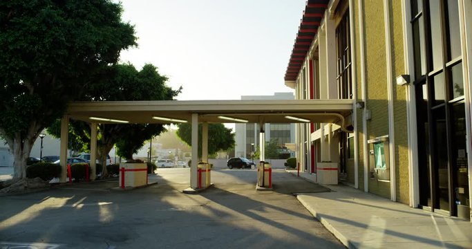 Bank Teller Shadows At China Town In Los Angeles, California. 