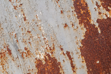 surface of rusty iron with remnants of old paint,  grunge metal surface, texture background