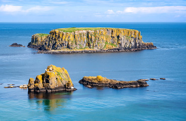The Sheep Island and two smaller ones near Ballintoy, Carrick-a-Rede and Giant's Causeway, North...