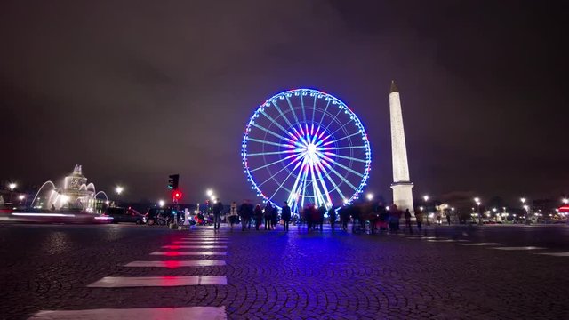 paris night ferris wheel at place de la concorde sidewalk traffic panorama 4k time lapse france
