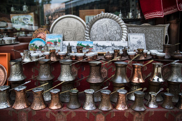 Traditional handcrafted copper coffee pots in souvenir shop in Sarajevo