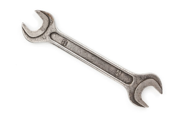 Old wrench isolated on white background