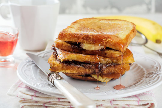 Chocolate Banana French Toast On A Light Background. Selective Focus.