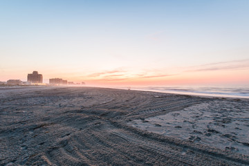Sandy Beach in ventnor city beach in atlantic city, new jersey at sunrise © Christian Hinkle