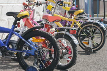 Fototapeta na wymiar Parking for bicycles near the kindergarten