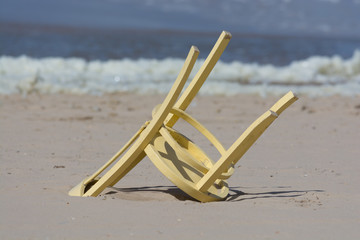 Yellow Upside Down Chair on the Beach