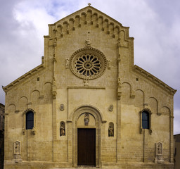 Fototapeta na wymiar Cathedral of Matera under blue sky. Matera in Italy UNESCO European Capital of Culture 2019