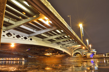 Fototapeta na wymiar The town Bridge across the river.