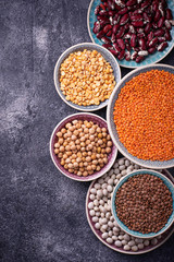 Various legumes. Chickpeas, red lentils, black lentils, yellow peas and beans