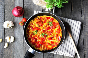 omelette with red peppers with parsley 